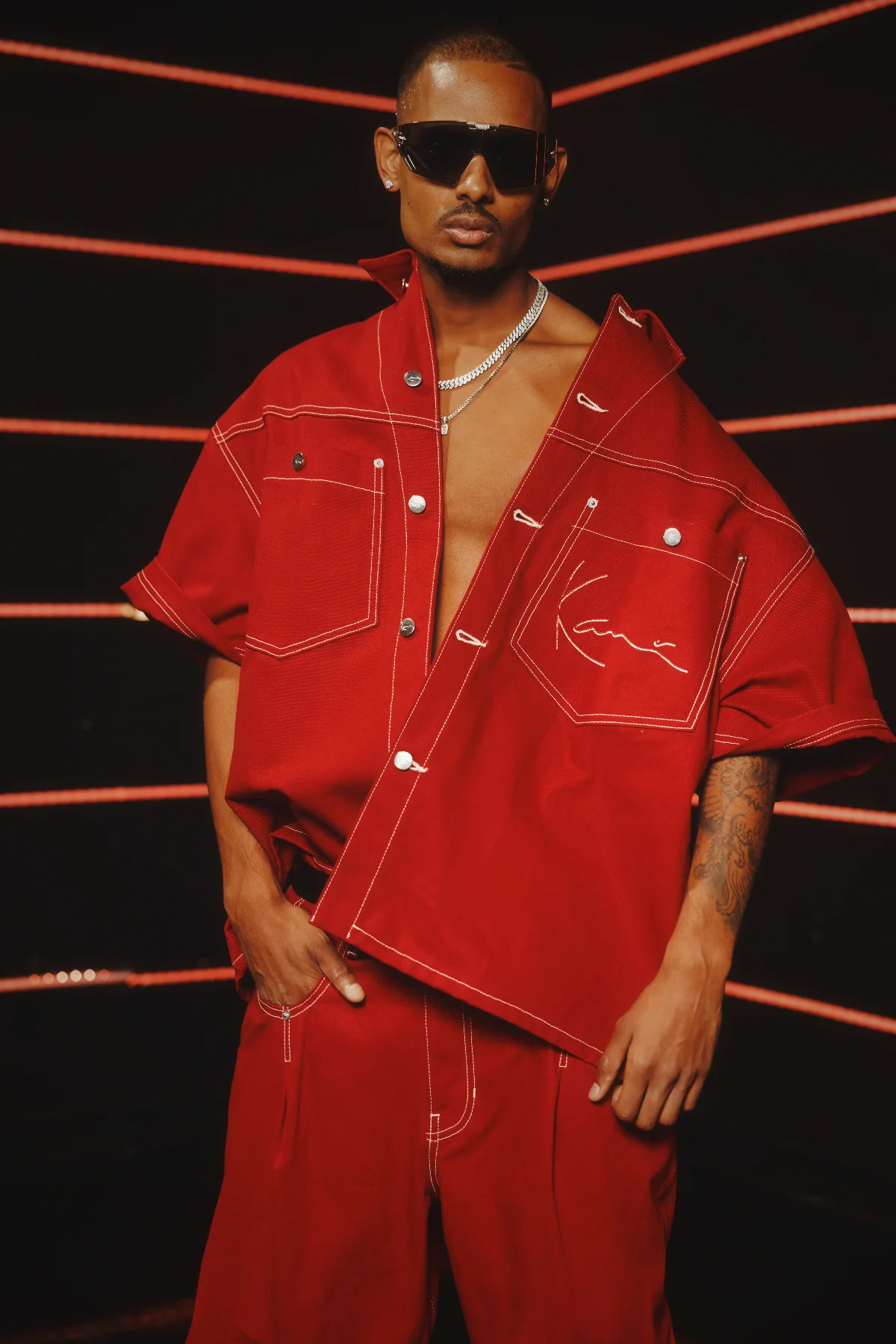 NIJO in a custom Red Canvas Karl Kani set, shot by Calvin G