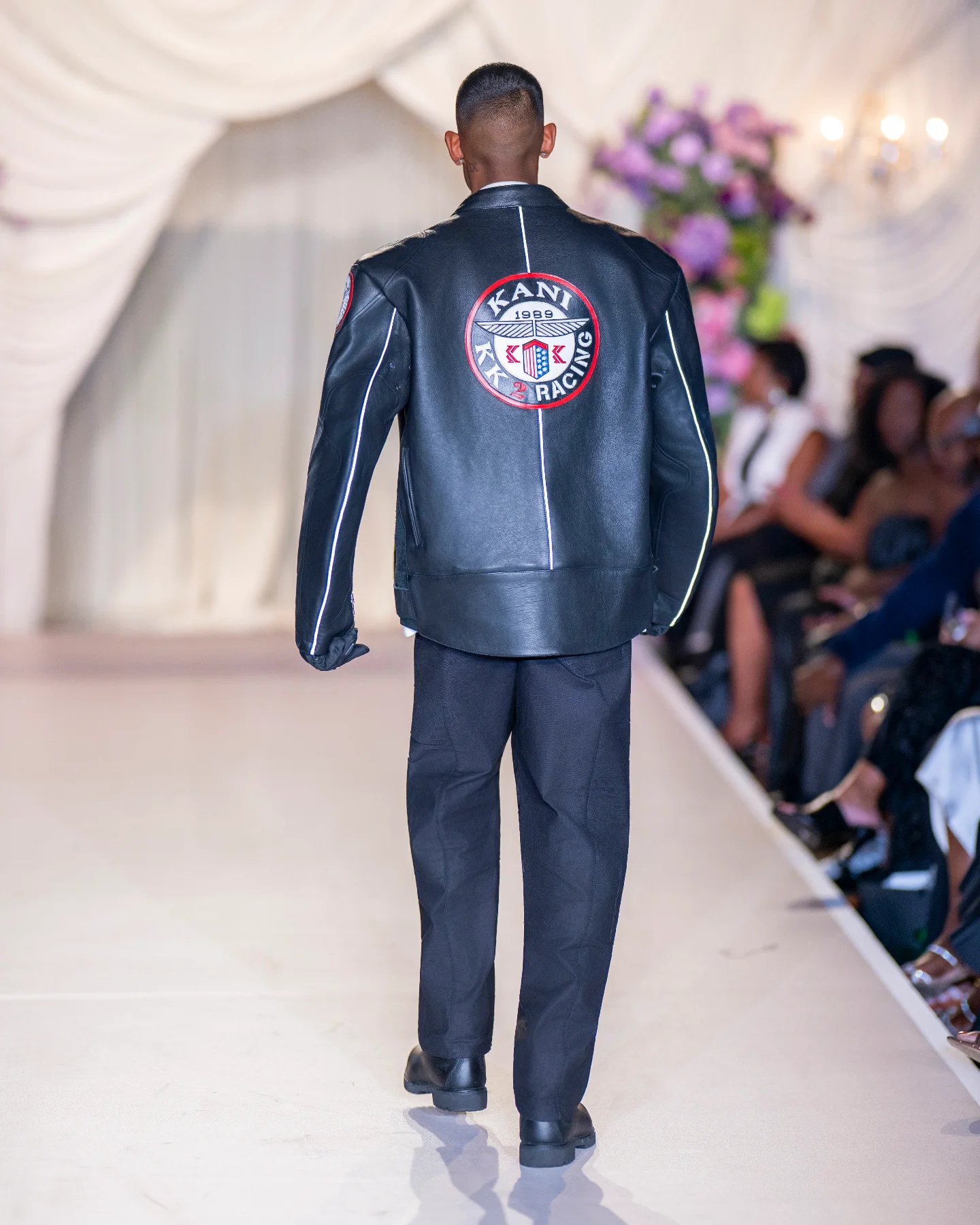 NIJO at the Emerge! Show — back of the Karl Kani KK Racing 1989 leather jacket