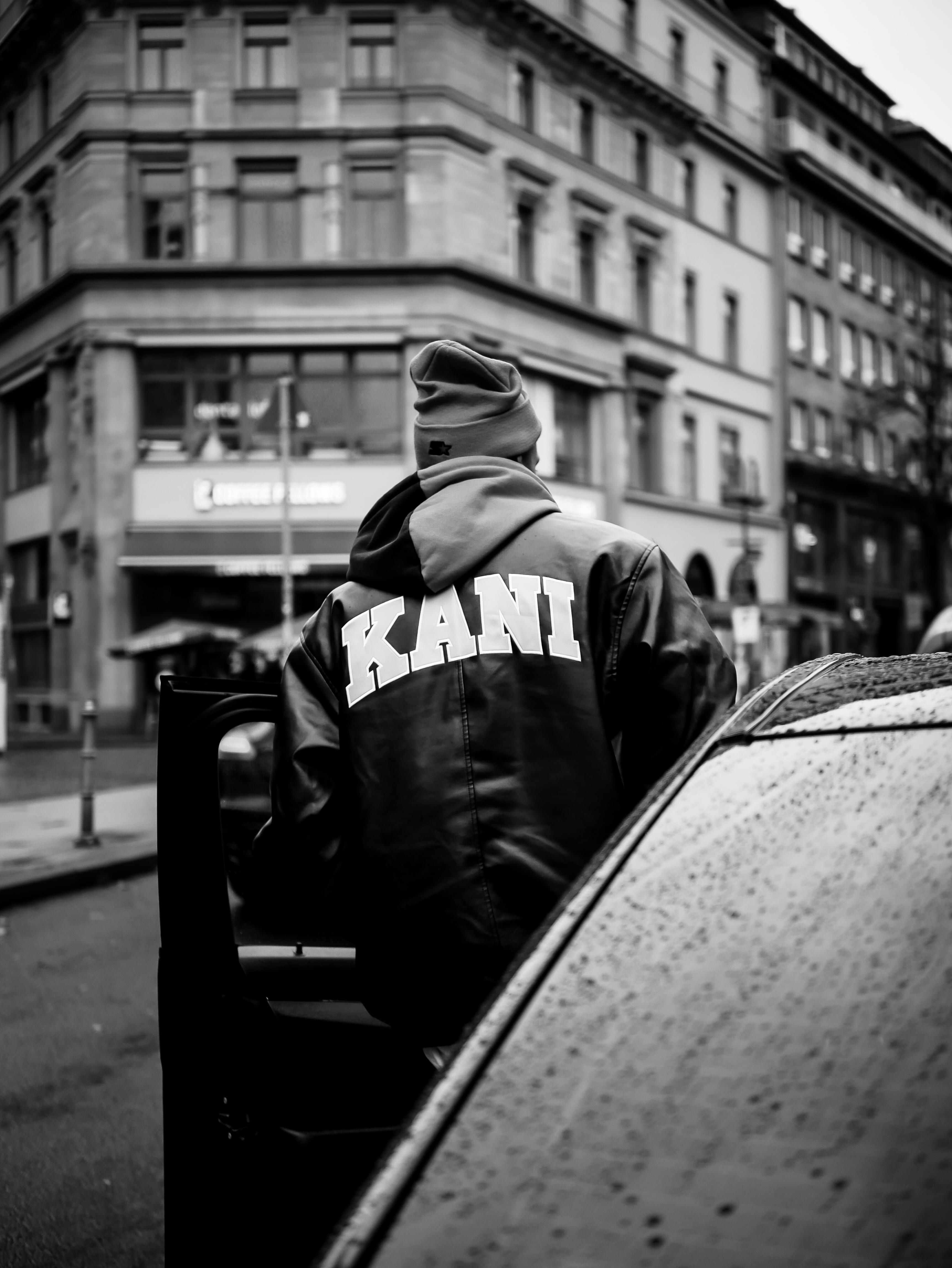 Karl Kani leather jacket back detail — patch wall, K shield, K star